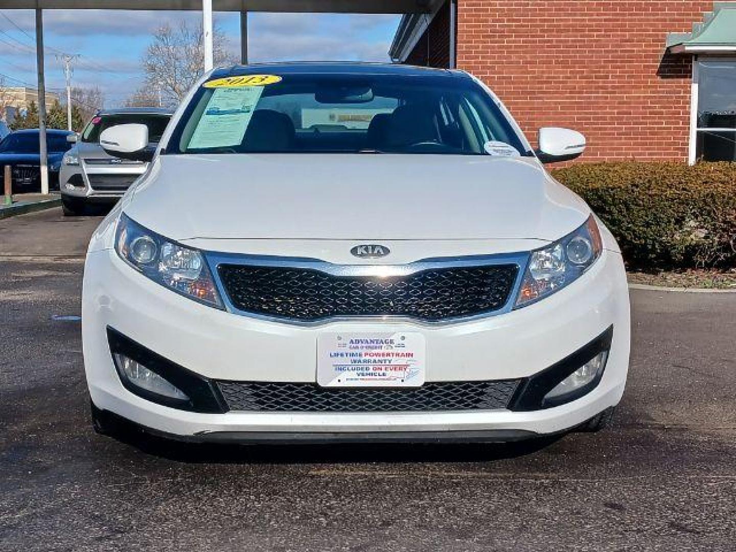 2013 Snow White Pearl Kia Optima EX (5XXGN4A7XDG) with an 2.4L L4 DOHC 16V engine, 6-Speed Automatic transmission, located at 401 Woodman Dr, Riverside, OH, 45431, (937) 908-9800, 39.763779, -84.122063 - Photo#1