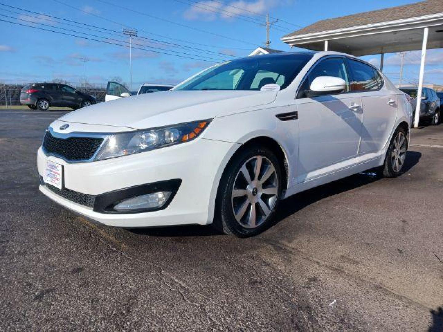 2013 Snow White Pearl Kia Optima EX (5XXGN4A7XDG) with an 2.4L L4 DOHC 16V engine, 6-Speed Automatic transmission, located at 401 Woodman Dr, Riverside, OH, 45431, (937) 908-9800, 39.763779, -84.122063 - Photo#2