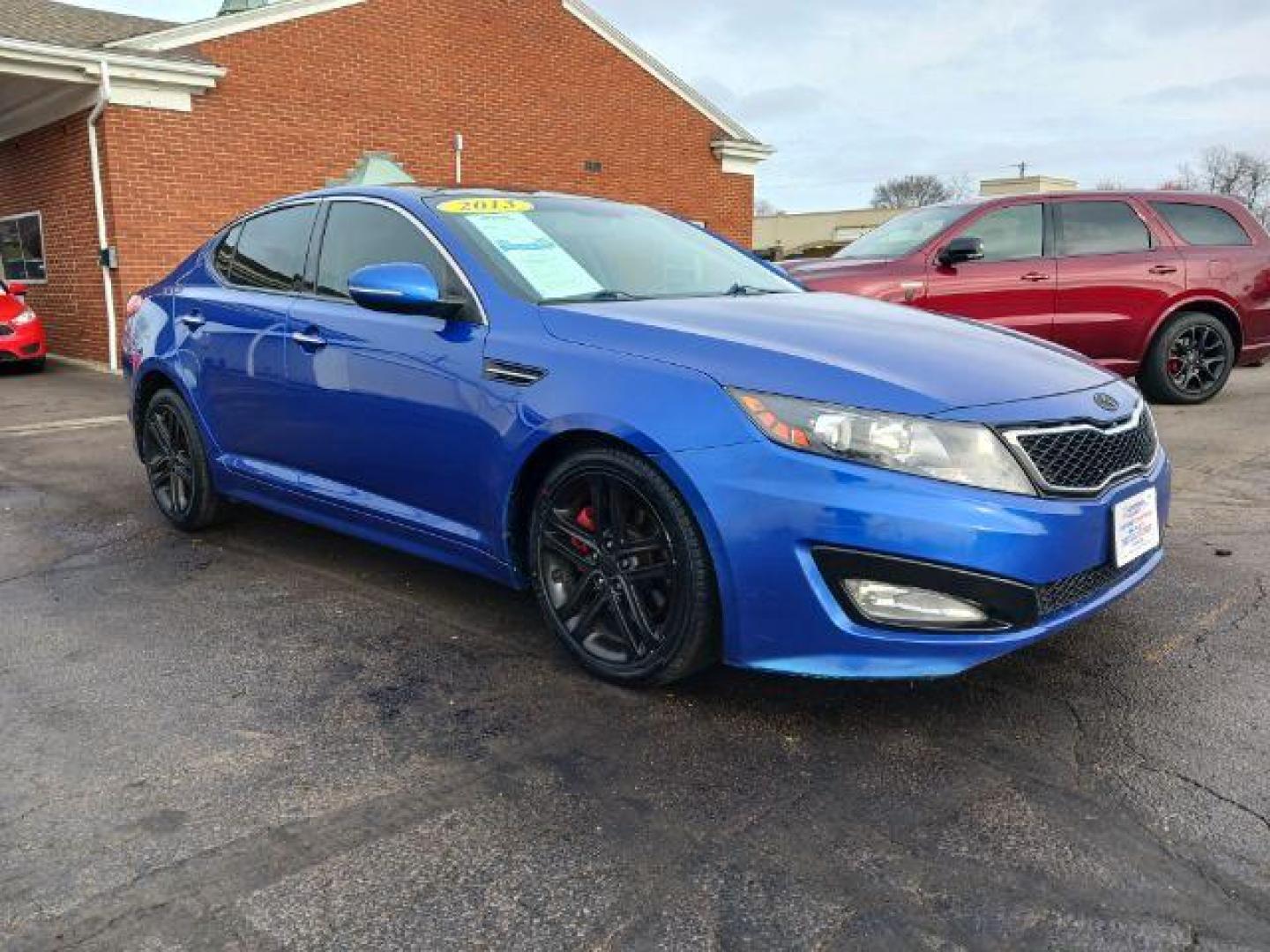 2013 Corsa Blue Pearl Metallic Kia Optima SX (5XXGR4A67DG) with an 2.0L L4 DOHC 16V TURBO engine, 6-Speed Automatic transmission, located at 1230 East Main St, Xenia, OH, 45385, (937) 908-9800, 39.687321, -83.910294 - Photo#0