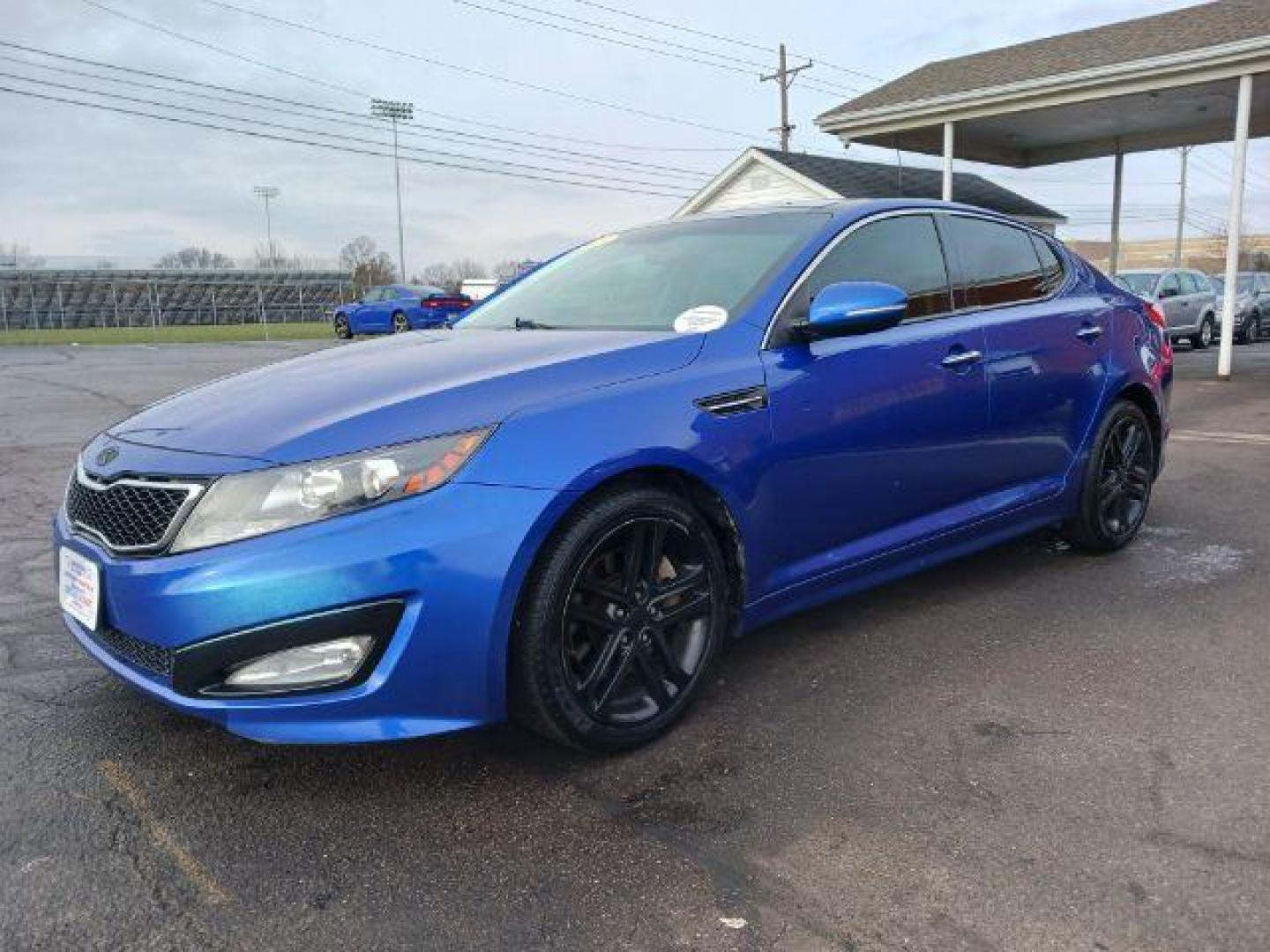 2013 Corsa Blue Pearl Metallic Kia Optima SX (5XXGR4A67DG) with an 2.0L L4 DOHC 16V TURBO engine, 6-Speed Automatic transmission, located at 1230 East Main St, Xenia, OH, 45385, (937) 908-9800, 39.687321, -83.910294 - Photo#2