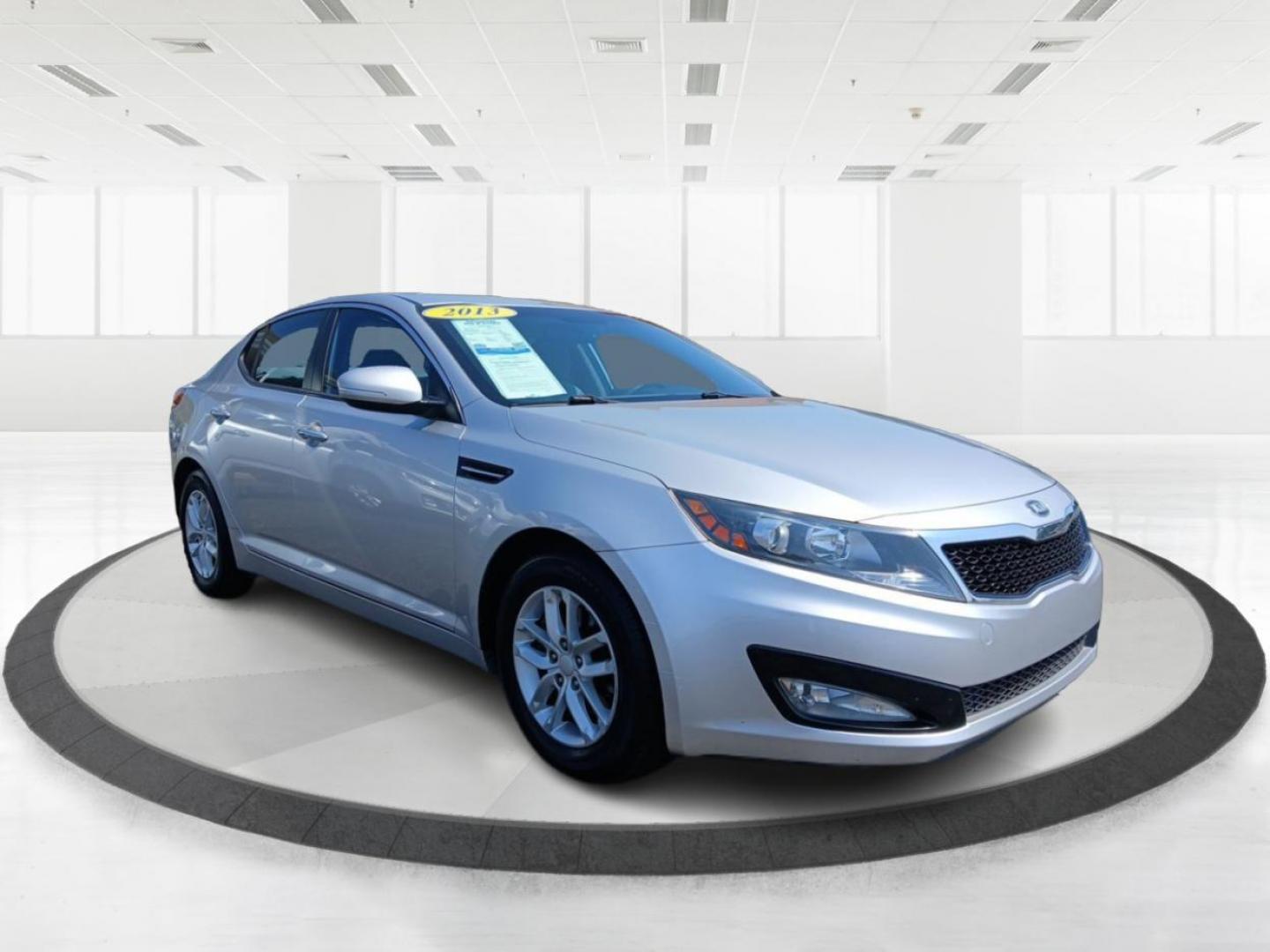 2013 Bright Silver Metallic Kia Optima LX AT (KNAGM4A78D5) with an 2.4L L4 DOHC 16V engine, 6-Speed Automatic transmission, located at 1184 Kauffman Ave, Fairborn, OH, 45324, (937) 908-9800, 39.807365, -84.029114 - Photo#0