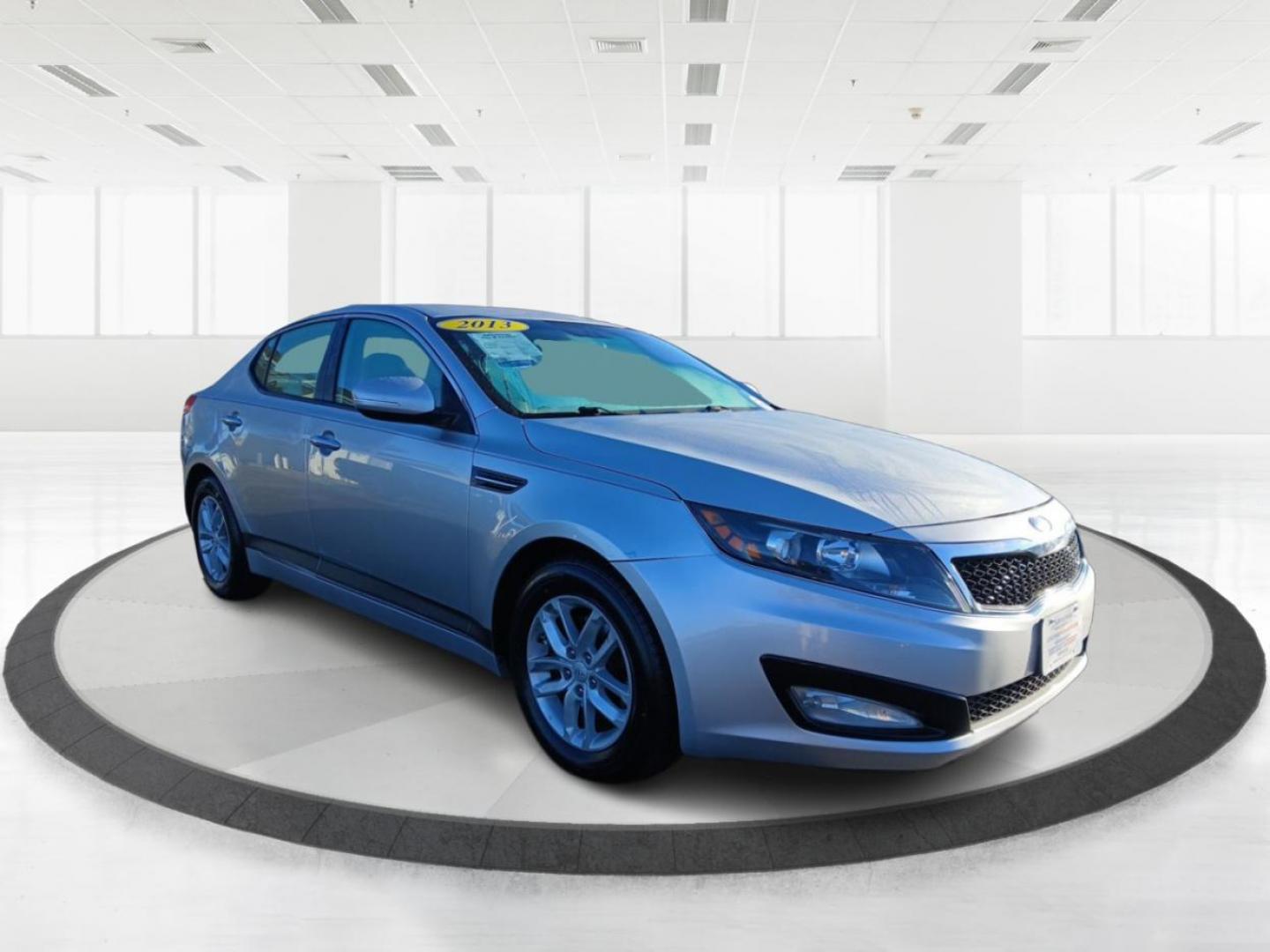 2013 Titanium Metallic Kia Optima LX MT (KNAGM4A76D5) with an 2.4L L4 DOHC 16V engine, 6-Speed Manual transmission, located at 1184 Kauffman Ave, Fairborn, OH, 45324, (937) 908-9800, 39.807365, -84.029114 - Photo#0