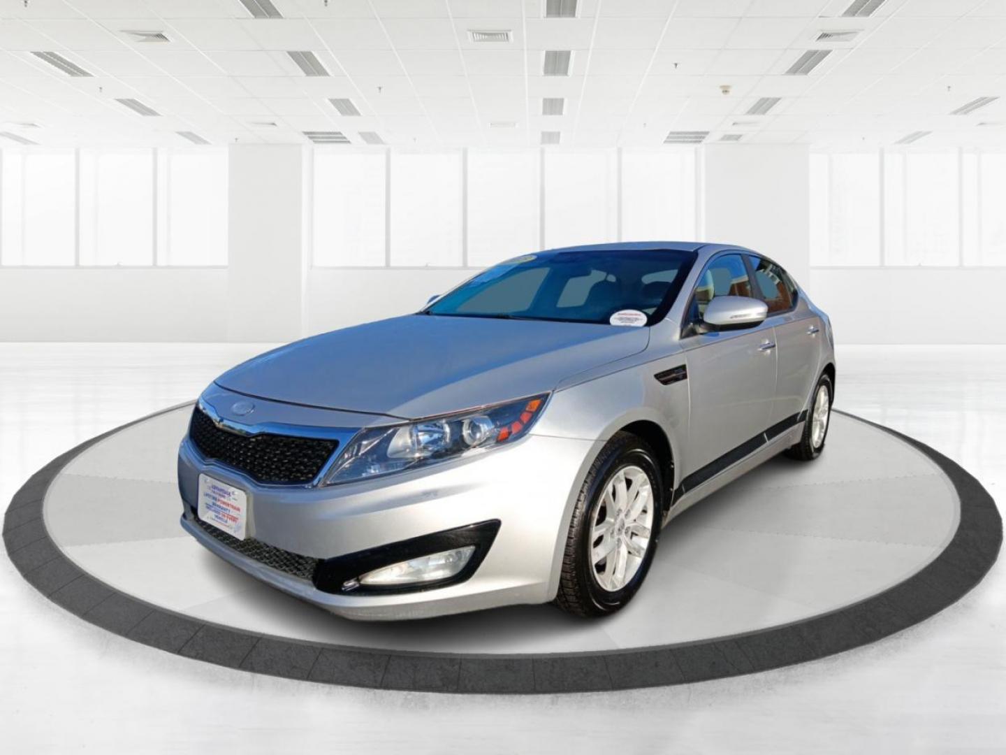 2013 Titanium Metallic Kia Optima LX MT (KNAGM4A76D5) with an 2.4L L4 DOHC 16V engine, 6-Speed Manual transmission, located at 1184 Kauffman Ave, Fairborn, OH, 45324, (937) 908-9800, 39.807365, -84.029114 - Photo#7