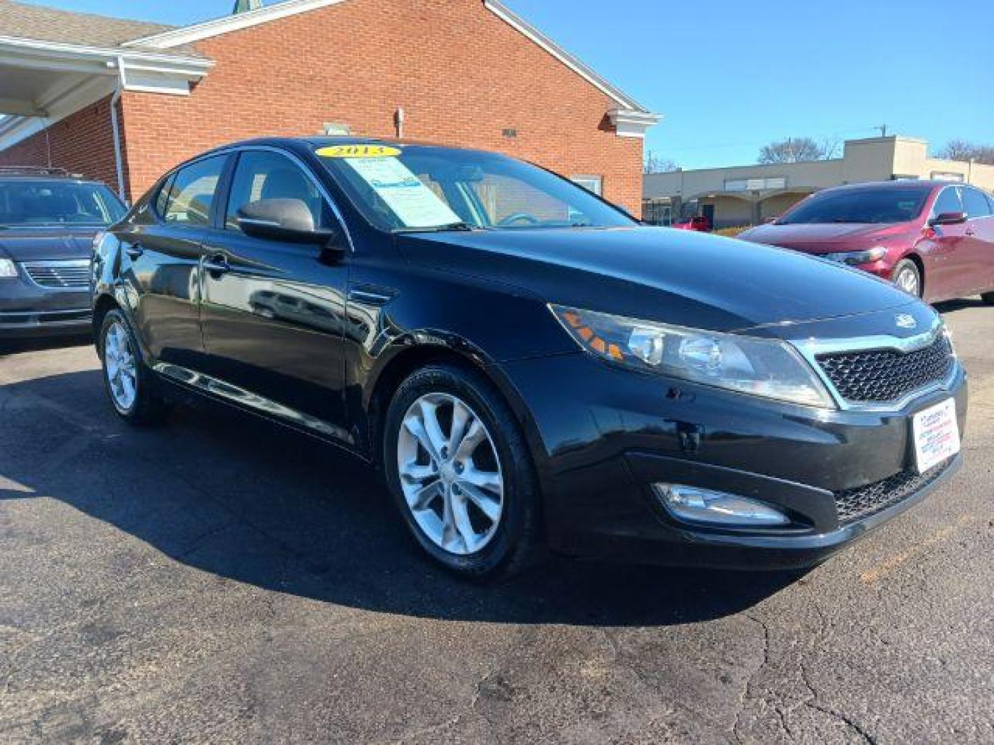 2013 Ebony Black Kia Optima LX AT (5XXGM4A73DG) with an 2.4L L4 DOHC 16V engine, 6-Speed Automatic transmission, located at 1230 East Main St, Xenia, OH, 45385, (937) 908-9800, 39.687321, -83.910294 - Photo#0