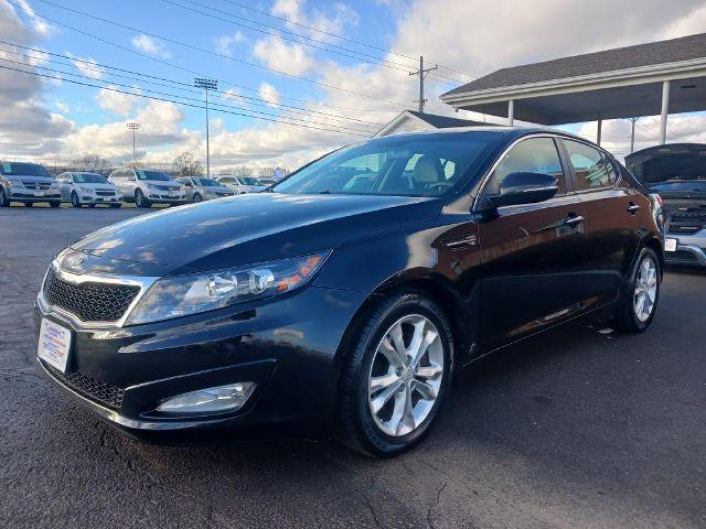 2013 Ebony Black Kia Optima LX AT (5XXGM4A73DG) with an 2.4L L4 DOHC 16V engine, 6-Speed Automatic transmission, located at 1230 East Main St, Xenia, OH, 45385, (937) 908-9800, 39.687321, -83.910294 - Photo#2