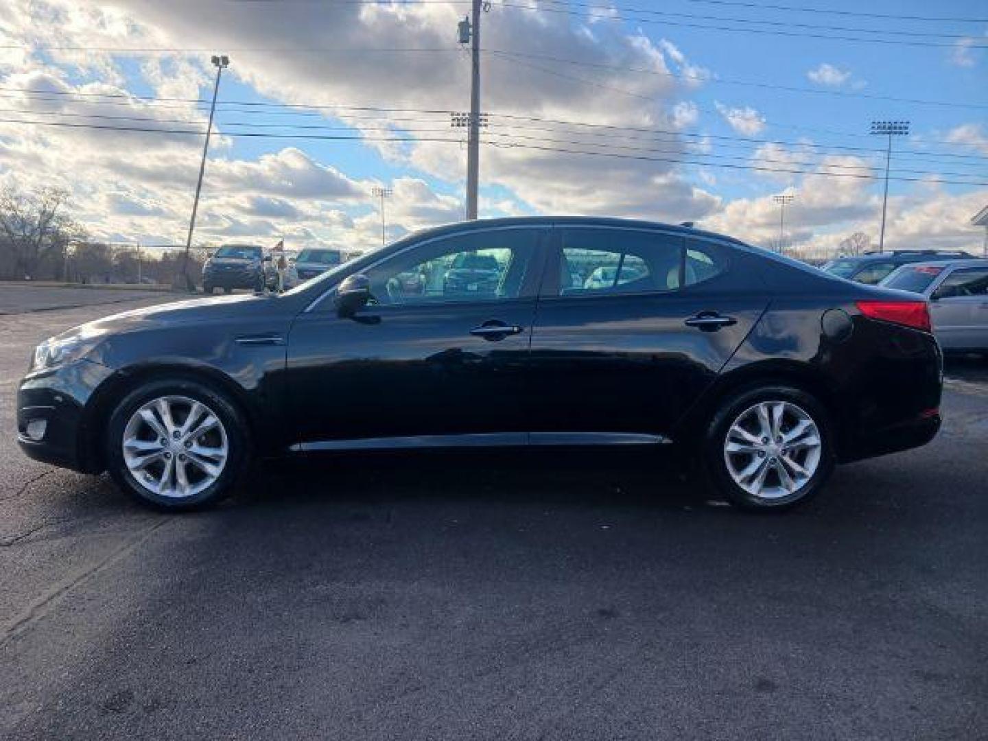 2013 Ebony Black Kia Optima LX AT (5XXGM4A73DG) with an 2.4L L4 DOHC 16V engine, 6-Speed Automatic transmission, located at 1230 East Main St, Xenia, OH, 45385, (937) 908-9800, 39.687321, -83.910294 - Photo#3