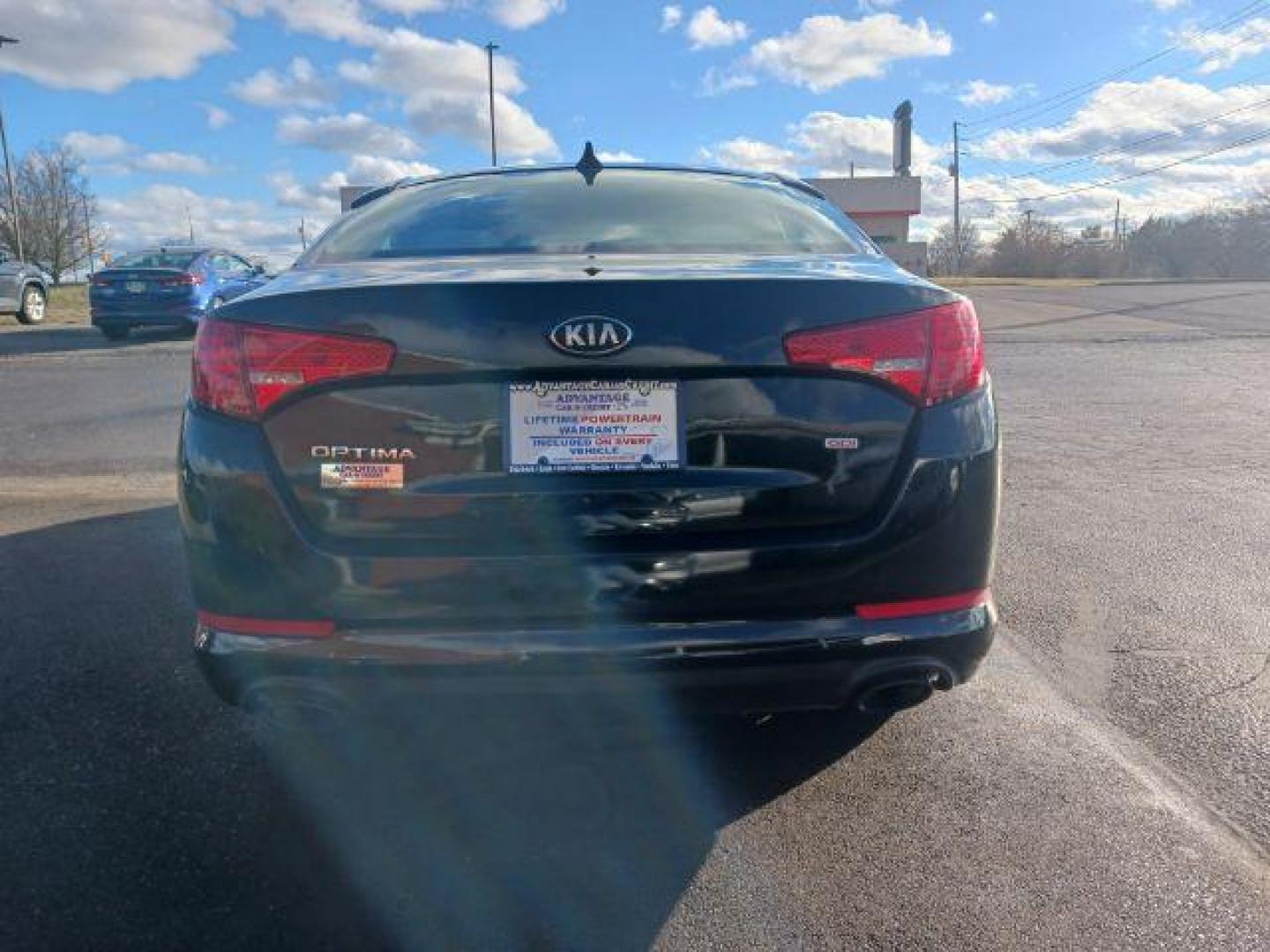 2013 Ebony Black Kia Optima LX AT (5XXGM4A73DG) with an 2.4L L4 DOHC 16V engine, 6-Speed Automatic transmission, located at 1230 East Main St, Xenia, OH, 45385, (937) 908-9800, 39.687321, -83.910294 - Photo#5