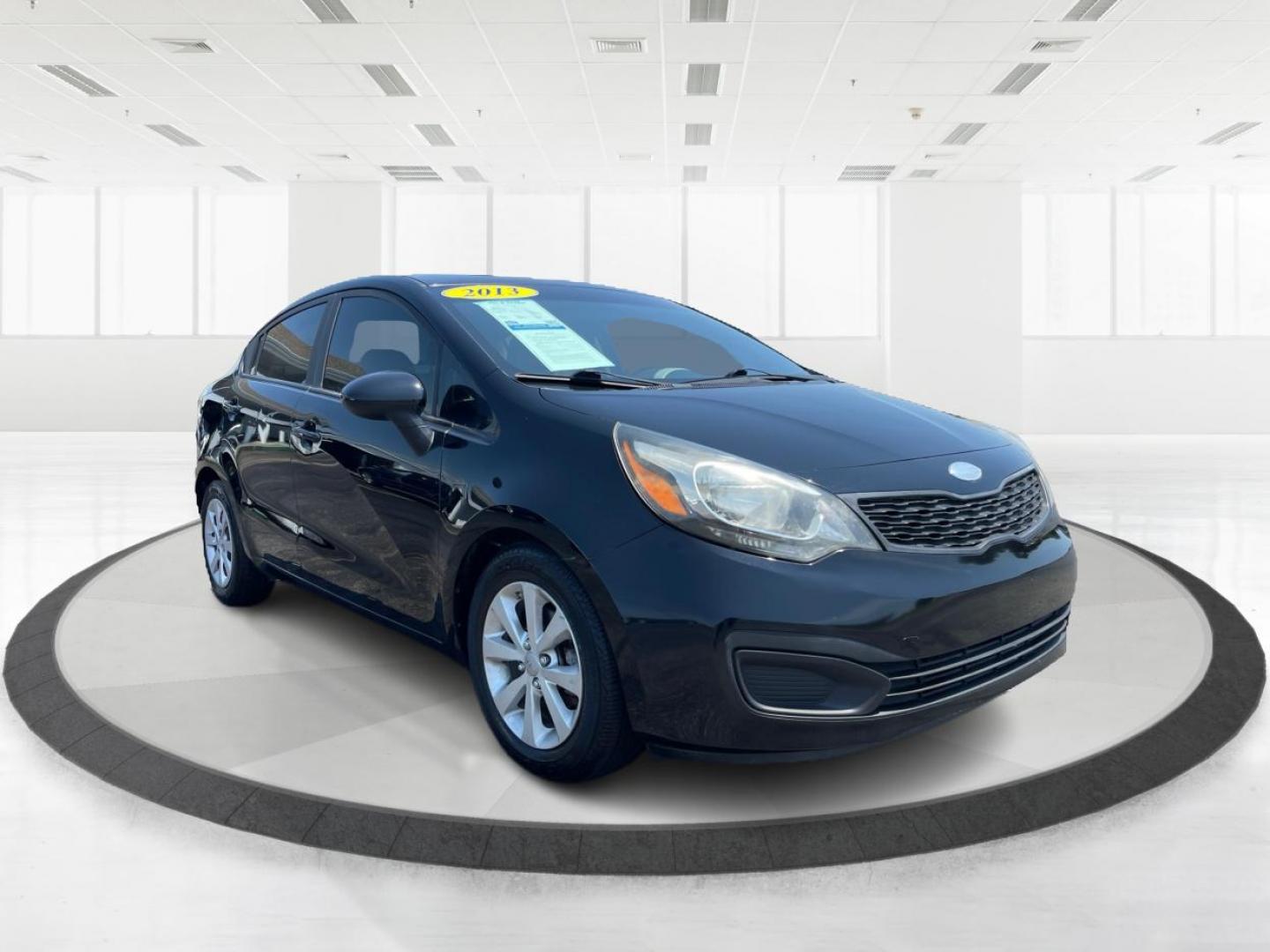 2013 Aurora Black Pearl Kia Rio LX (KNADM4A32D6) with an 1.6L L4 DOHC 16V engine, located at 1230 East Main St, Xenia, OH, 45385, (937) 908-9800, 39.687321, -83.910294 - Photo#0