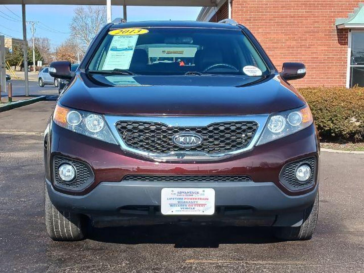 2013 Dark Cherry Kia Sorento EX 4WD (5XYKUCA67DG) with an 2.4L L4 DOHC 16V engine, 6-Speed Automatic transmission, located at 1951 S Dayton Lakeview Rd., New Carlisle, OH, 45344, (937) 908-9800, 39.890999, -84.050255 - Photo#1