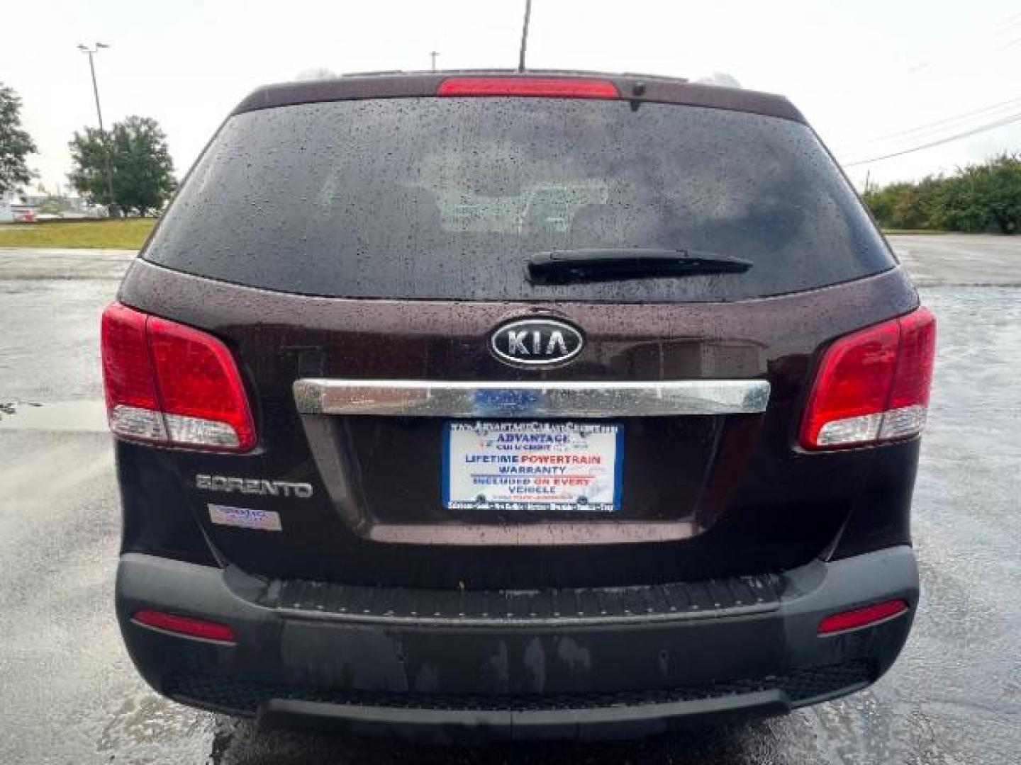 2013 Dark Cherry Kia Sorento LX 4WD (5XYKTDA67DG) with an 2.4L L4 DOHC 16V engine, 6-Speed Automatic transmission, located at 401 Woodman Dr, Riverside, OH, 45431, (937) 908-9800, 39.763779, -84.122063 - Photo#4