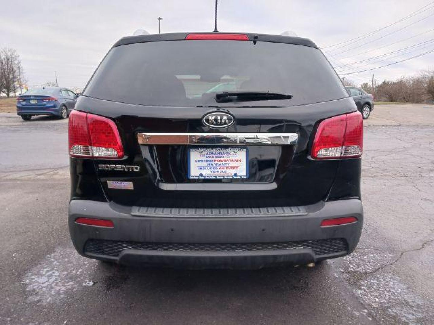 2013 Ebony Black Kia Sorento LX 2WD (5XYKT3A68DG) with an 2.4L L4 DOHC 16V engine, 6-Speed Automatic transmission, located at 401 Woodman Dr, Riverside, OH, 45431, (937) 908-9800, 39.763779, -84.122063 - Photo#5