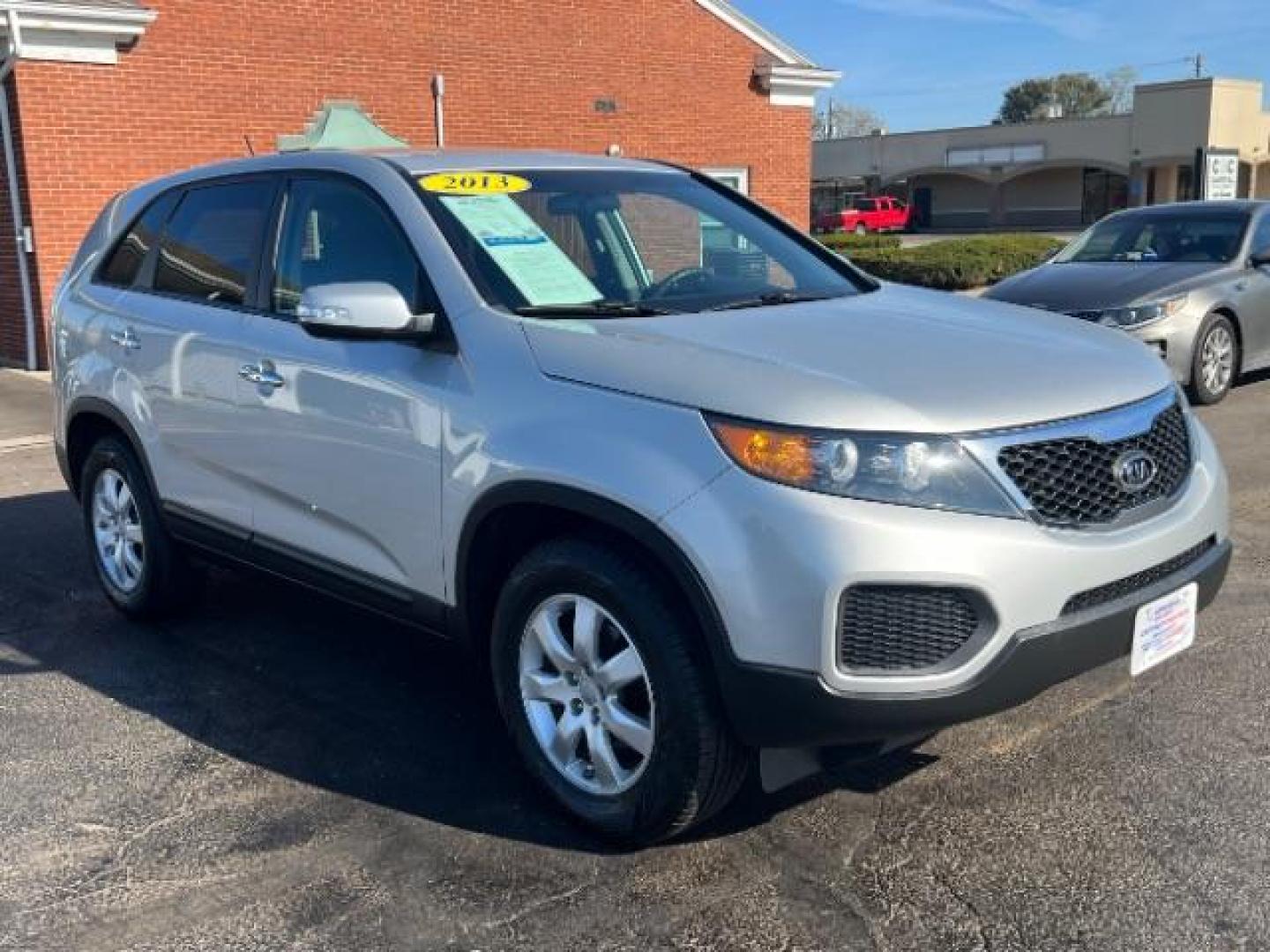 2013 Bright Silver Kia Sorento LX 2WD (5XYKT3A16DG) with an 2.4L L4 DOHC 16V engine, 6-Speed Automatic transmission, located at 1184 Kauffman Ave, Fairborn, OH, 45324, (937) 908-9800, 39.807365, -84.029114 - Photo#0