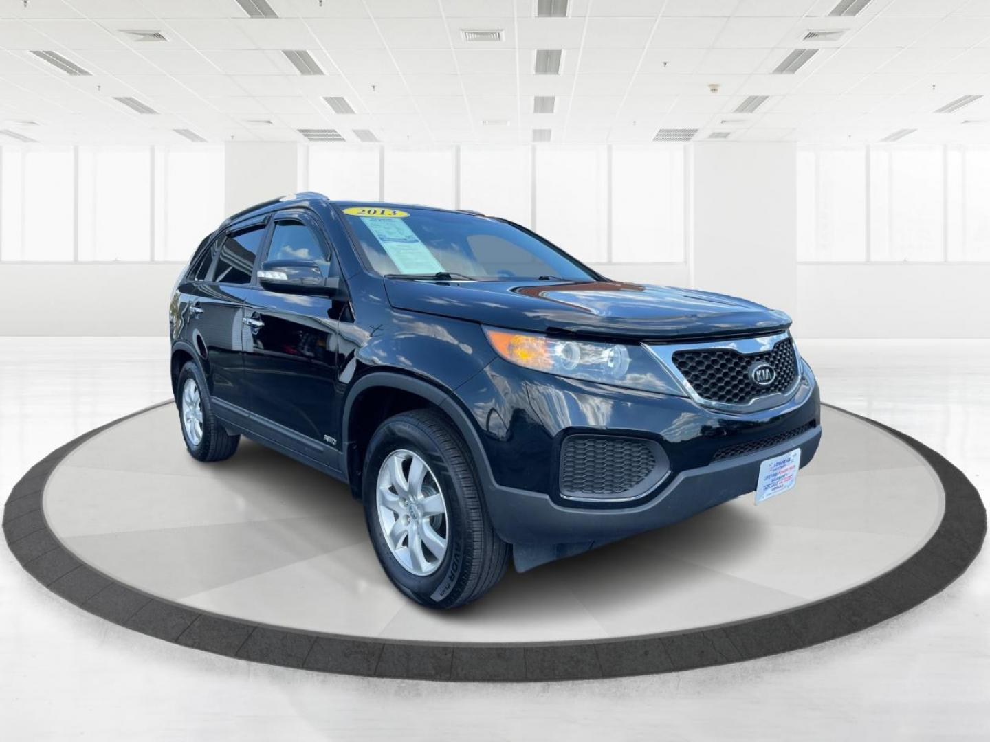 2013 Ebony Black Kia Sorento LX V6 4WD (5XYKTDA29DG) with an 3.5L V6 DOHC 24V engine, 6-Speed Automatic transmission, located at 4508 South Dixie Dr, Moraine, OH, 45439, (937) 908-9800, 39.690136, -84.216438 - Photo#0