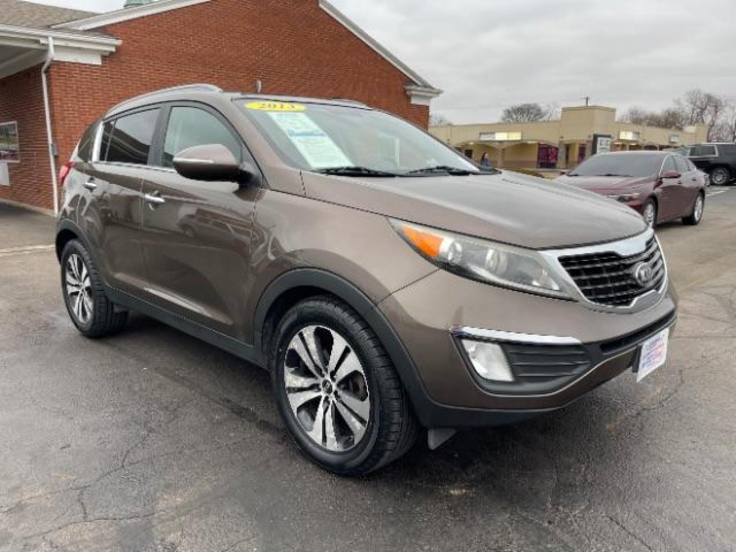 2013 Sand Track Kia Sportage EX FWD (KNDPC3A20D7) with an 2.4L V6 DOHC 24V engine, 6-Speed Automatic transmission, located at 1184 Kauffman Ave, Fairborn, OH, 45324, (937) 908-9800, 39.807365, -84.029114 - Photo#0