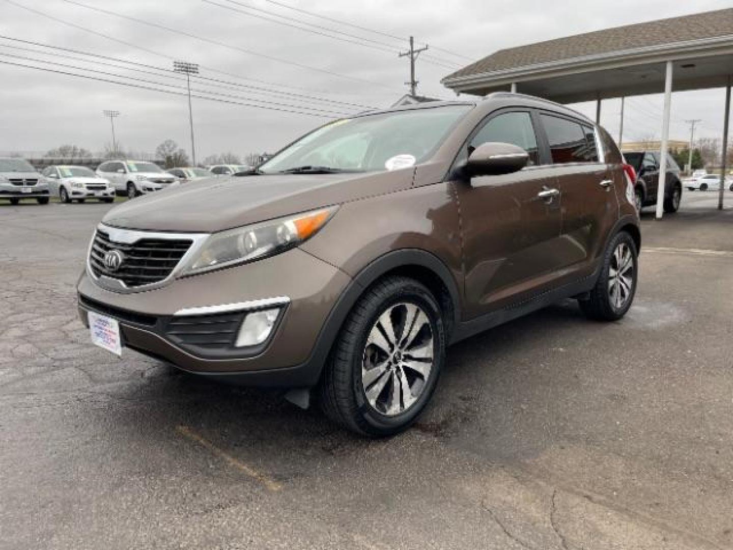 2013 Sand Track Kia Sportage EX FWD (KNDPC3A20D7) with an 2.4L V6 DOHC 24V engine, 6-Speed Automatic transmission, located at 1184 Kauffman Ave, Fairborn, OH, 45324, (937) 908-9800, 39.807365, -84.029114 - Photo#1