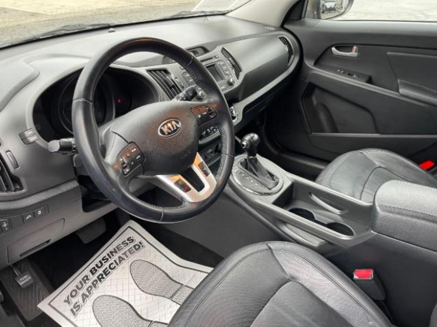 2013 Sand Track Kia Sportage EX FWD (KNDPC3A20D7) with an 2.4L V6 DOHC 24V engine, 6-Speed Automatic transmission, located at 1184 Kauffman Ave, Fairborn, OH, 45324, (937) 908-9800, 39.807365, -84.029114 - Photo#6