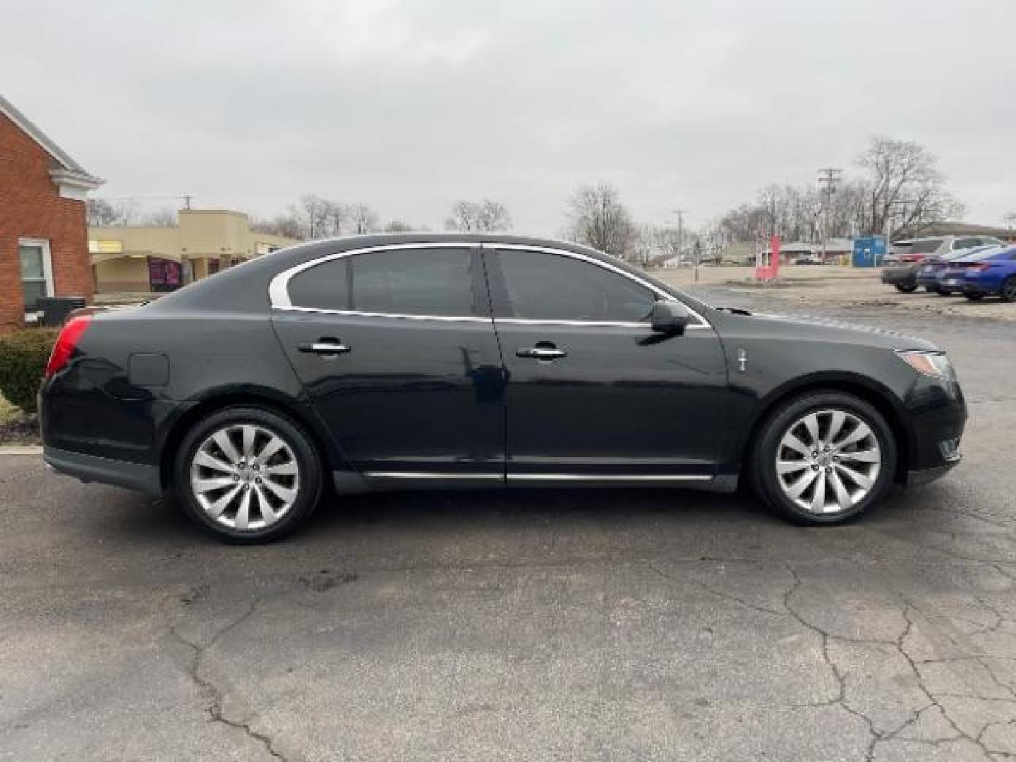 2013 Tuxedo Black Lincoln MKS FWD (1LNHL9DK0DG) with an 3.5L V6 DOHC 24V engine, 6-Speed Automatic transmission, located at 1230 East Main St, Xenia, OH, 45385, (937) 908-9800, 39.687321, -83.910294 - Photo#3