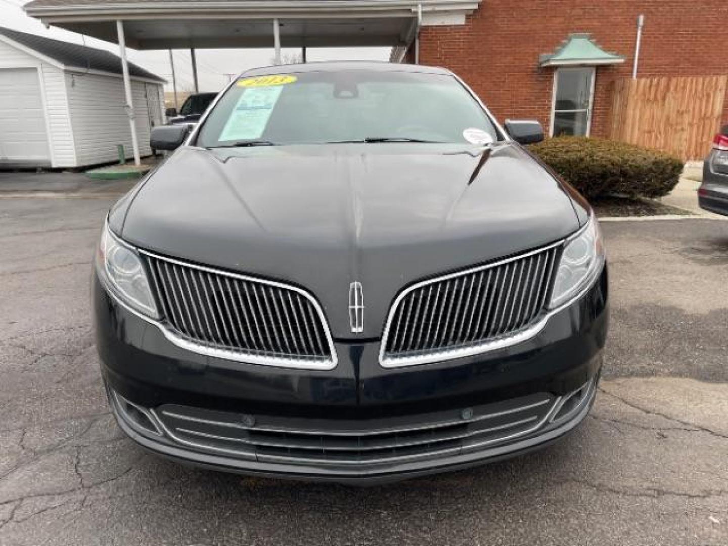 2013 Tuxedo Black Lincoln MKS FWD (1LNHL9DK0DG) with an 3.5L V6 DOHC 24V engine, 6-Speed Automatic transmission, located at 1230 East Main St, Xenia, OH, 45385, (937) 908-9800, 39.687321, -83.910294 - Photo#5