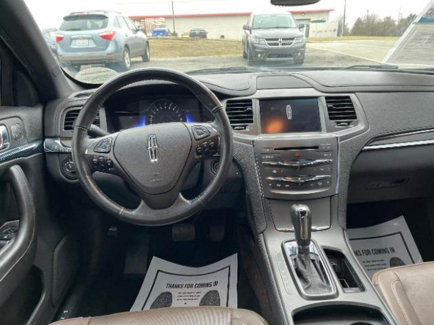 2013 Tuxedo Black Lincoln MKS FWD (1LNHL9DK0DG) with an 3.5L V6 DOHC 24V engine, 6-Speed Automatic transmission, located at 1230 East Main St, Xenia, OH, 45385, (937) 908-9800, 39.687321, -83.910294 - Photo#7