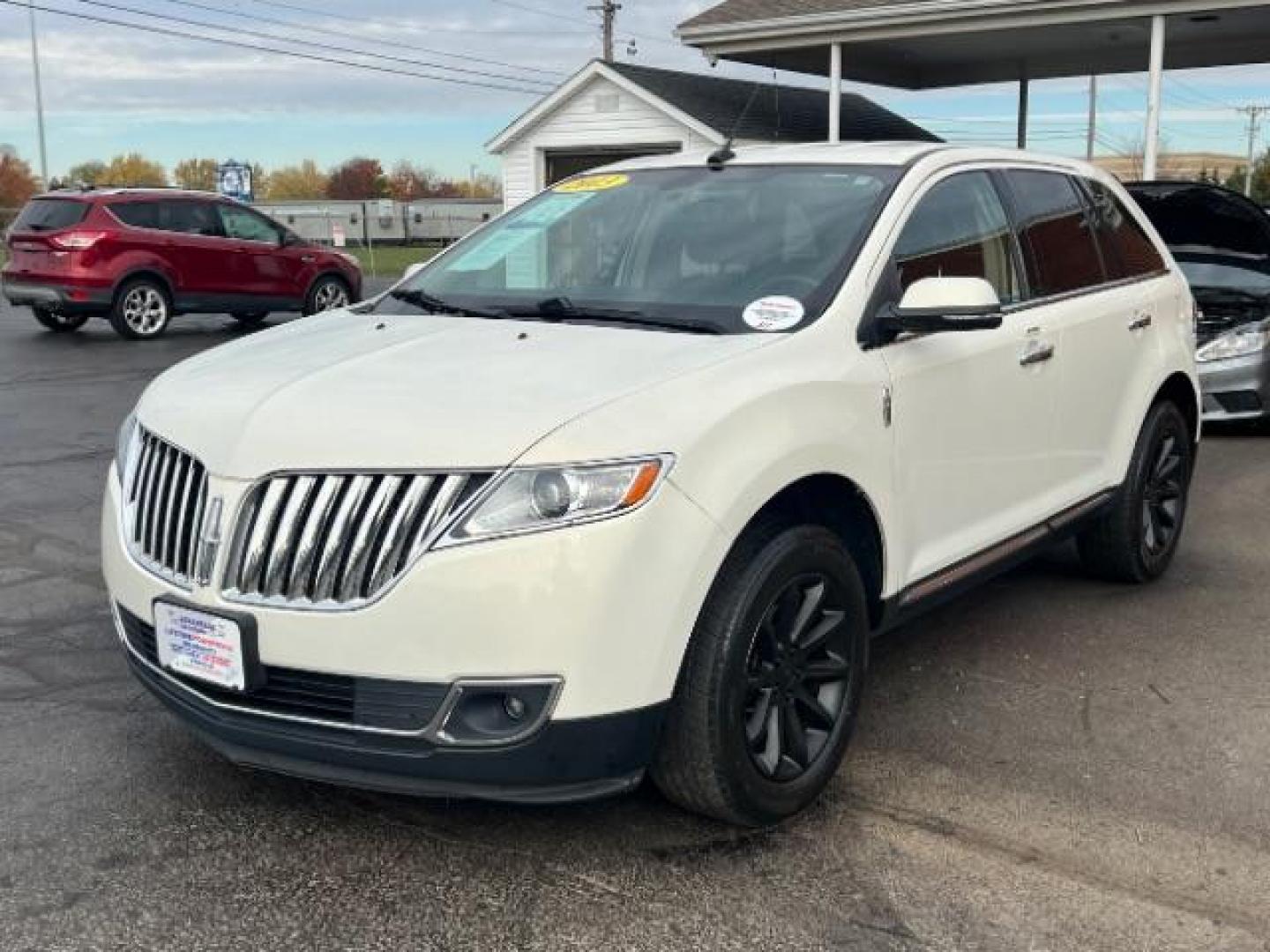 2013 White Platinum Metallic Tri-Coat Lincoln MKX AWD (2LMDJ8JK1DB) with an 3.7L V6 DOHC 24V engine, 6-Speed Automatic transmission, located at 1951 S Dayton Lakeview Rd., New Carlisle, OH, 45344, (937) 908-9800, 39.890999, -84.050255 - Photo#2