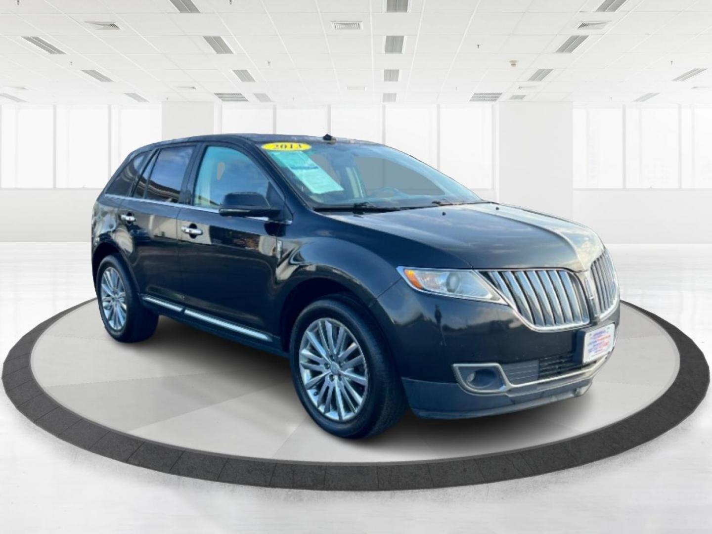 2013 Tuxedo Black Metallic Lincoln MKX AWD (2LMDJ8JK8DB) with an 3.7L V6 DOHC 24V engine, 6-Speed Automatic transmission, located at 401 Woodman Dr, Riverside, OH, 45431, (937) 908-9800, 39.763779, -84.122063 - Photo#0