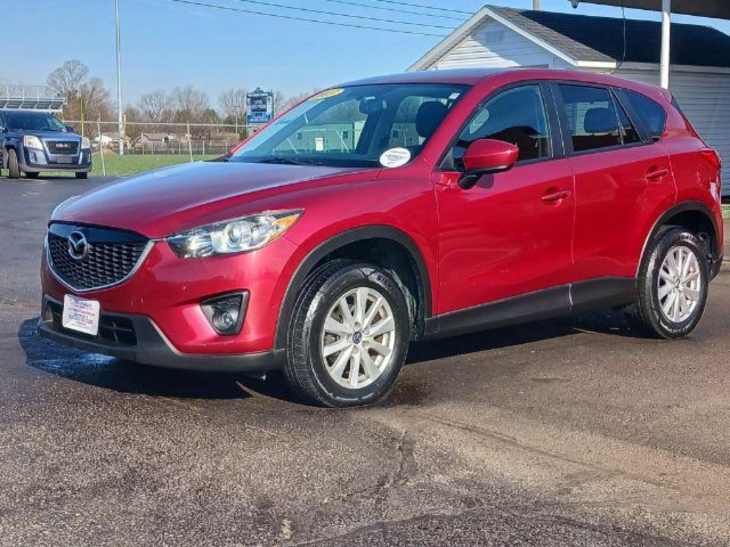 2013 Red Mazda CX-5 Touring AWD (JM3KE4CE4D0) with an 2.0L L4 DOHC 16V engine, 6-Speed Automatic transmission, located at 401 Woodman Dr, Riverside, OH, 45431, (937) 908-9800, 39.763779, -84.122063 - Photo#2