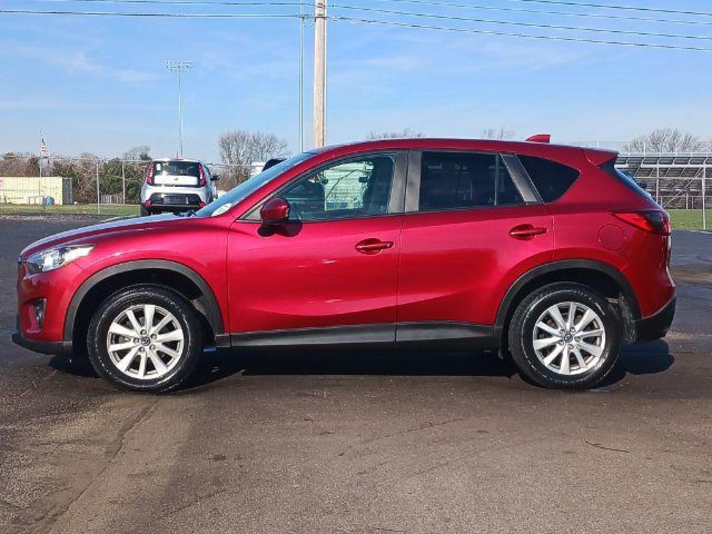 2013 Red Mazda CX-5 Touring AWD (JM3KE4CE4D0) with an 2.0L L4 DOHC 16V engine, 6-Speed Automatic transmission, located at 401 Woodman Dr, Riverside, OH, 45431, (937) 908-9800, 39.763779, -84.122063 - Photo#3