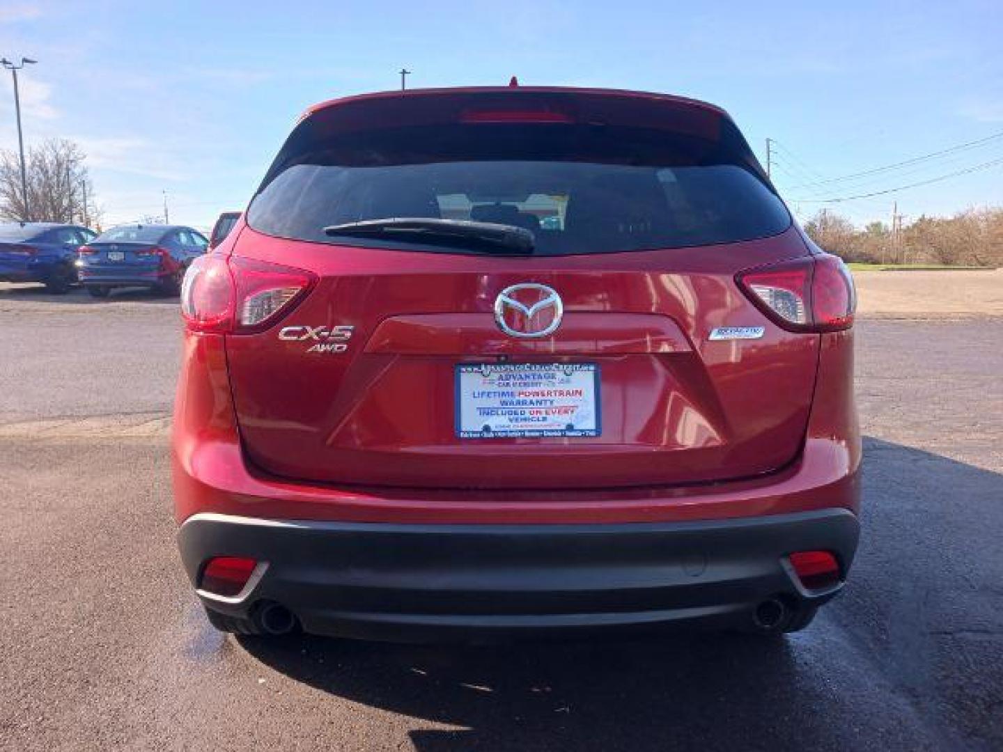 2013 Red Mazda CX-5 Touring AWD (JM3KE4CE4D0) with an 2.0L L4 DOHC 16V engine, 6-Speed Automatic transmission, located at 401 Woodman Dr, Riverside, OH, 45431, (937) 908-9800, 39.763779, -84.122063 - Photo#5