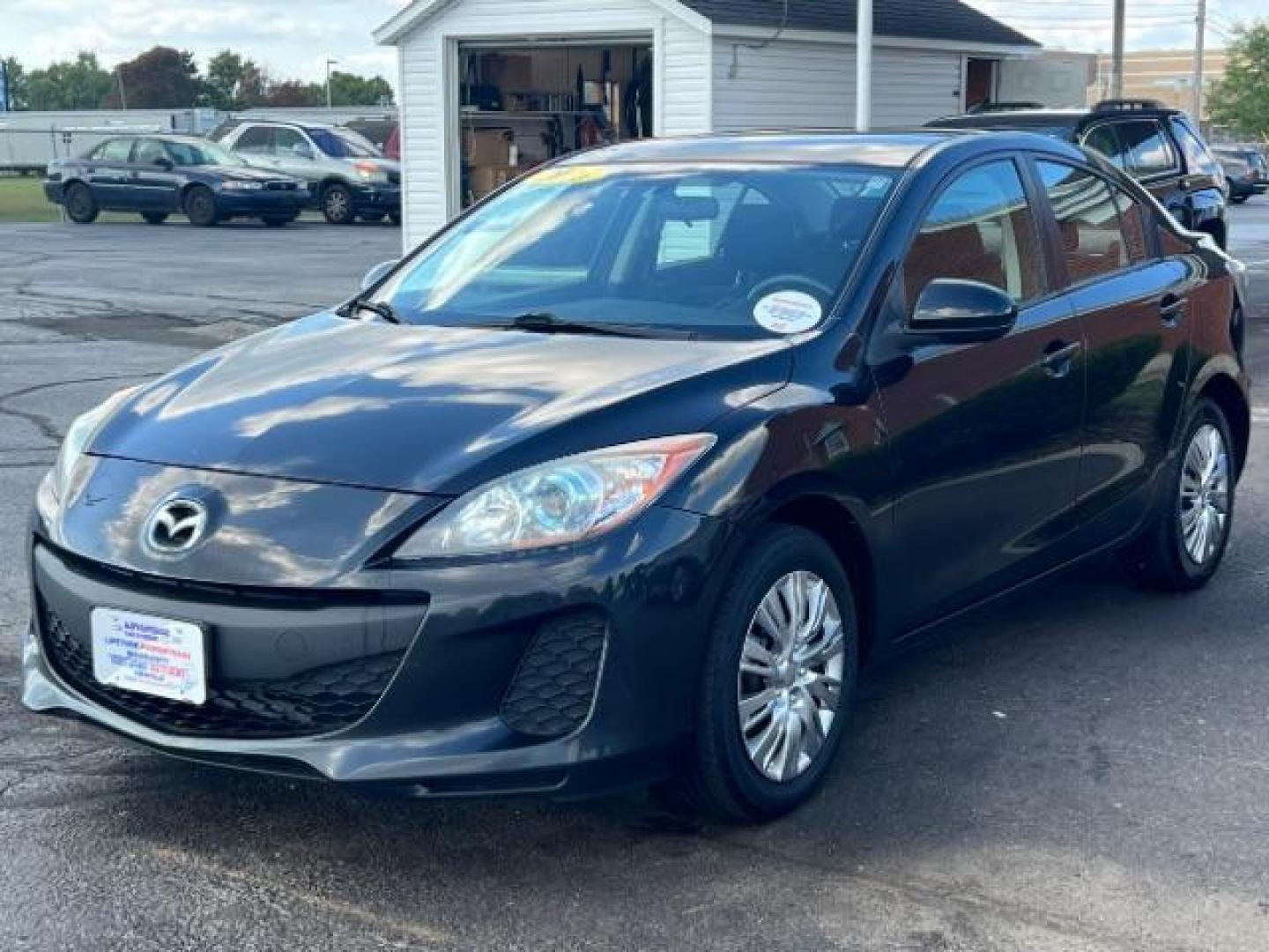 2013 Black Mica Mazda MAZDA3 i Sport 4-Door (JM1BL1U76D1) with an 2.0L L4 DOHC 16V engine, located at 1099 N County Rd 25A, OH, 45373, (937) 908-9800, 40.057079, -84.212883 - Photo#10