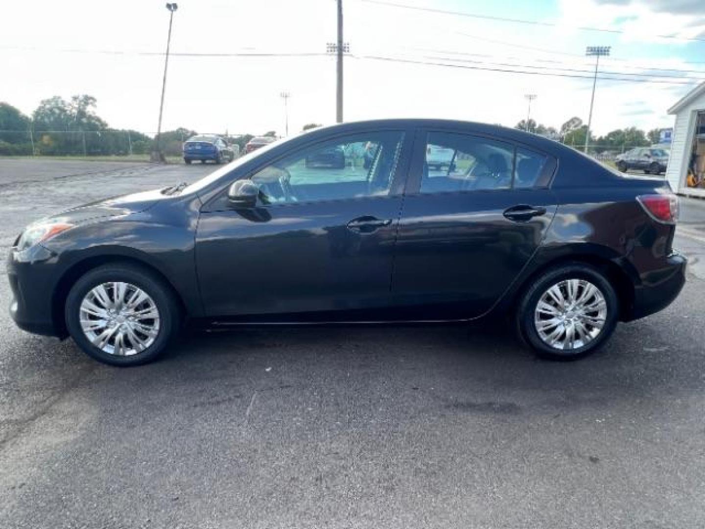 2013 Black Mica Mazda MAZDA3 i Sport 4-Door (JM1BL1U76D1) with an 2.0L L4 DOHC 16V engine, located at 1099 N County Rd 25A, OH, 45373, (937) 908-9800, 40.057079, -84.212883 - Photo#2