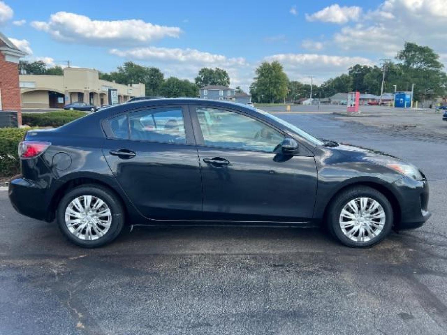 2013 Black Mica Mazda MAZDA3 i Sport 4-Door (JM1BL1U76D1) with an 2.0L L4 DOHC 16V engine, located at 1099 N County Rd 25A, OH, 45373, (937) 908-9800, 40.057079, -84.212883 - Photo#4