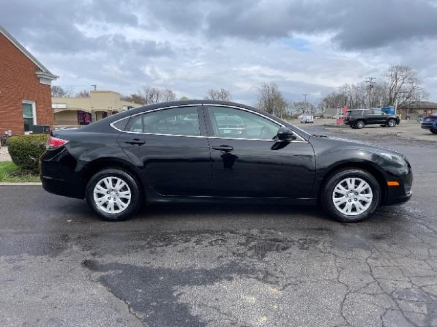 2013 Ebony Black Mazda Mazda6 i Sport (1YVHZ8BH8D5) with an 2.5L L4 DOHC 16V engine, 6-Speed Automatic transmission, located at 880 E. National Road, Vandalia, OH, 45377, (937) 908-9800, 39.892189, -84.181015 - Photo#3