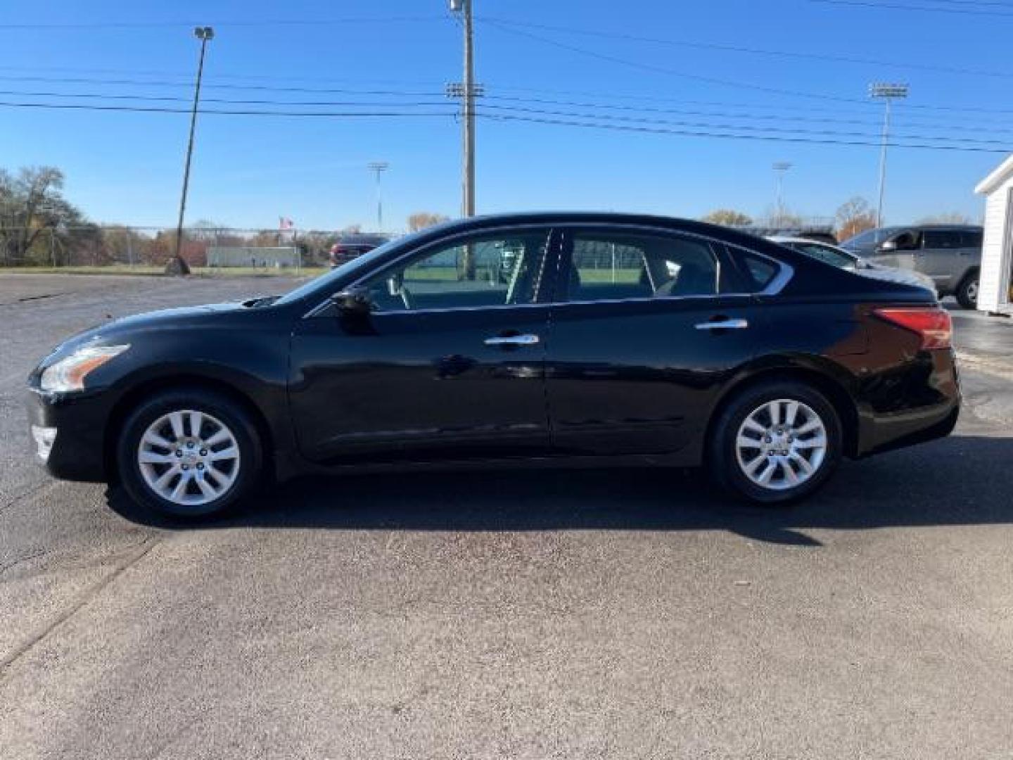 2013 Super Black Nissan Altima 2.5 (1N4AL3AP0DC) with an 2.5L L4 DOHC 16V engine, 6-Speed Manual transmission, located at 1099 N County Rd 25A, OH, 45373, (937) 908-9800, 40.057079, -84.212883 - Photo#2