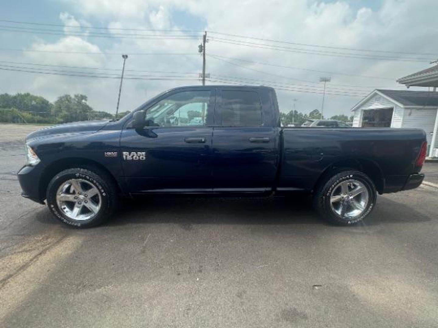 2013 True Blue Pearl RAM 1500 Tradesman Quad Cab 4WD (1C6RR7FT7DS) with an 5.7L V8 OHV 16V engine, 6-Speed Automatic transmission, located at 4508 South Dixie Dr, Moraine, OH, 45439, (937) 908-9800, 39.690136, -84.216438 - Photo#3