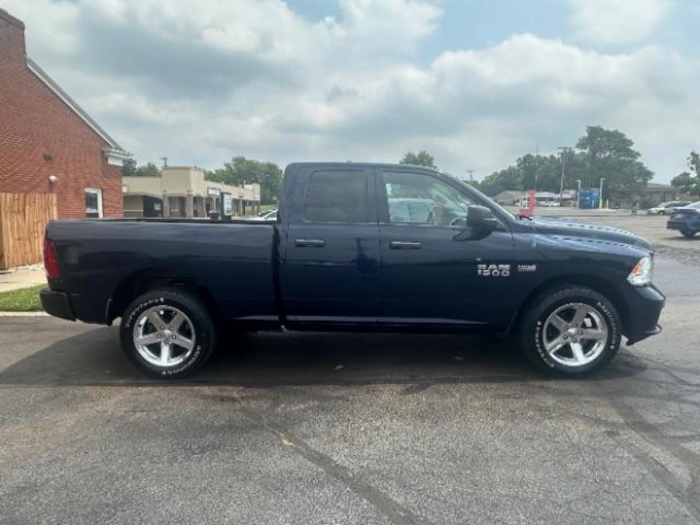 2013 True Blue Pearl RAM 1500 Tradesman Quad Cab 4WD (1C6RR7FT7DS) with an 5.7L V8 OHV 16V engine, 6-Speed Automatic transmission, located at 4508 South Dixie Dr, Moraine, OH, 45439, (937) 908-9800, 39.690136, -84.216438 - Photo#5