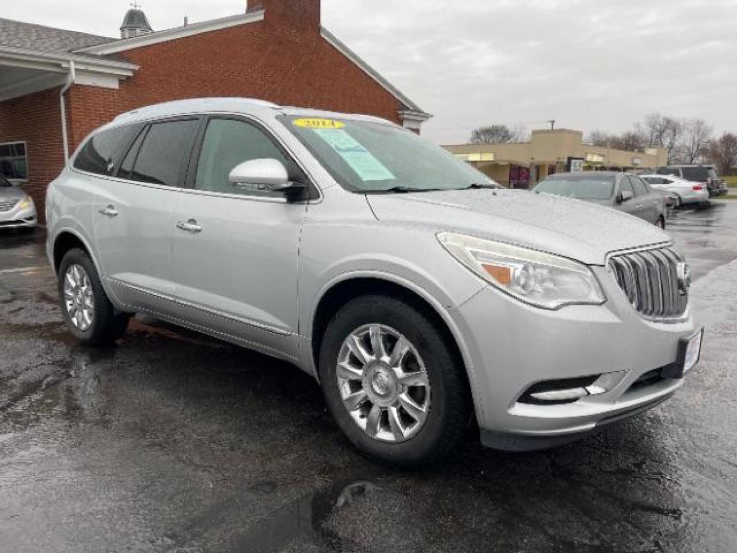 2014 Quicksilver Metallic Buick Enclave Leather FWD (5GAKRBKD4EJ) with an 3.6L V6 DOHC 24V engine, 6-Speed Automatic Overdrive transmission, located at 1099 N County Rd 25A, OH, 45373, (937) 908-9800, 40.057079, -84.212883 - Photo#0