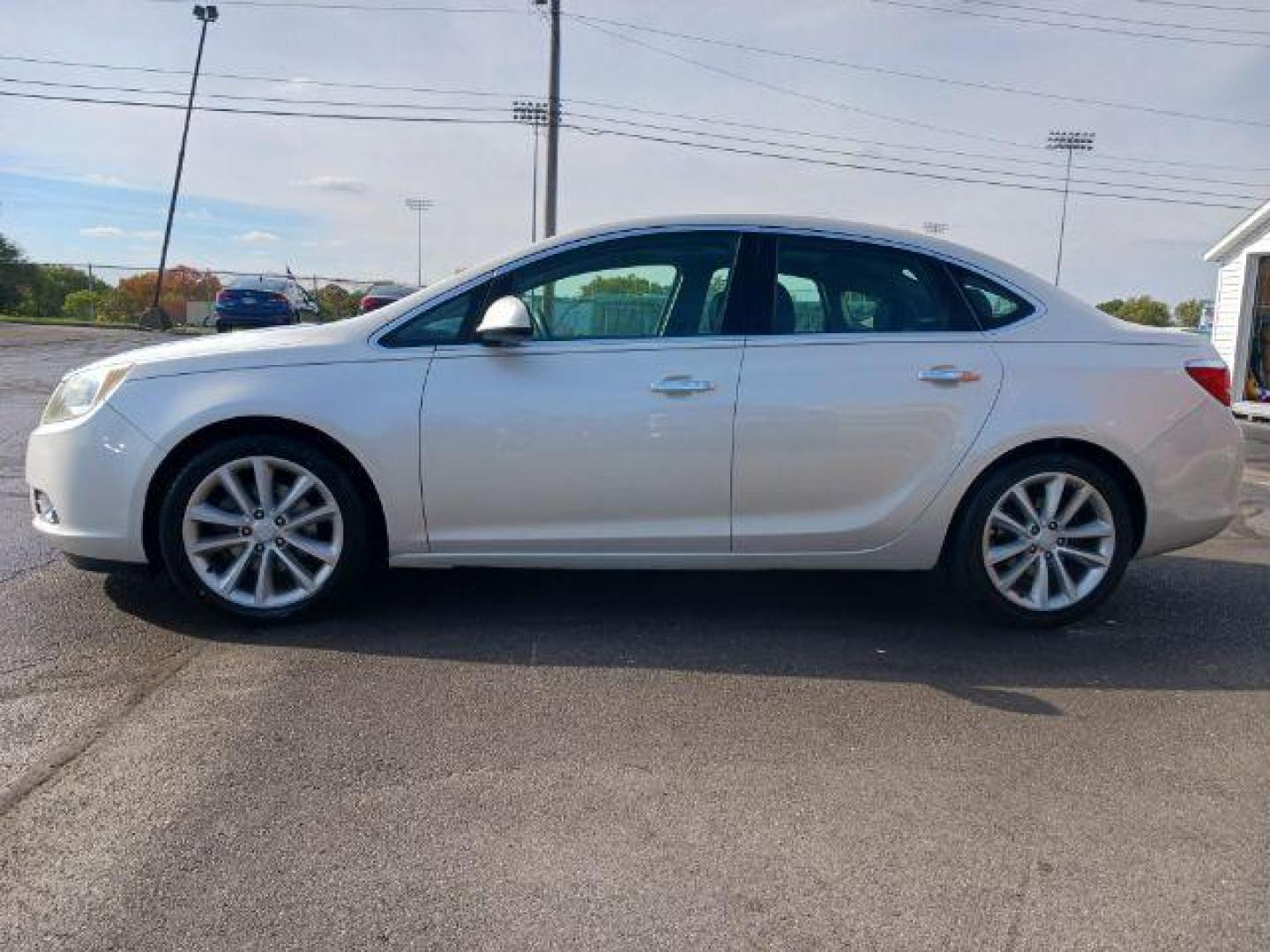 2014 Summit White Buick Verano Leather (1G4PS5SK2E4) with an 2.4L L4 DOHC 16V FFV engine, 6-Speed Automatic transmission, located at 880 E. National Road, Vandalia, OH, 45377, (937) 908-9800, 39.892189, -84.181015 - Photo#3