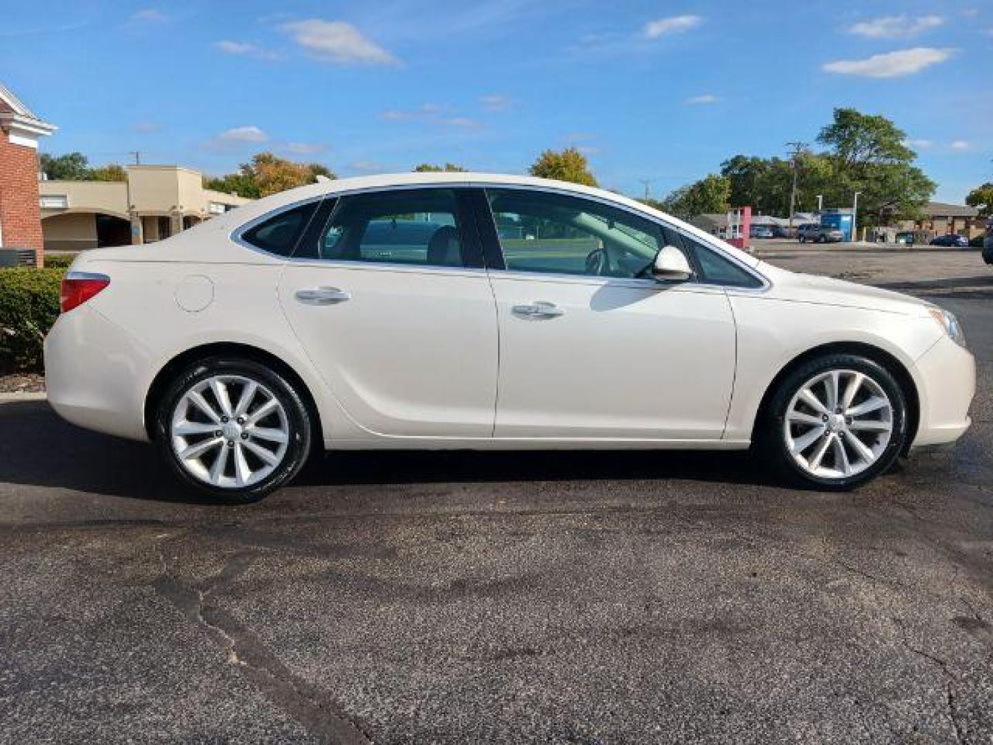 2014 Summit White Buick Verano Leather (1G4PS5SK2E4) with an 2.4L L4 DOHC 16V FFV engine, 6-Speed Automatic transmission, located at 880 E. National Road, Vandalia, OH, 45377, (937) 908-9800, 39.892189, -84.181015 - Photo#4