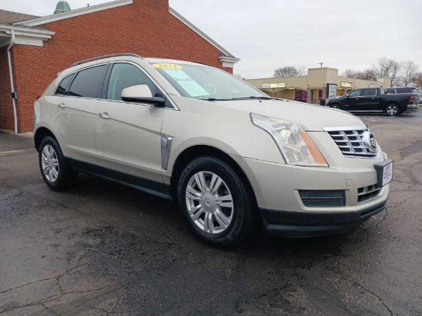 2014 Terra Mocha Metallic Cadillac SRX Standard FWD (3GYFNAE3XES) with an 3.6L V6 DOHC 24V FFV engine, 6-Speed Automatic transmission, located at 401 Woodman Dr, Riverside, OH, 45431, (937) 908-9800, 39.763779, -84.122063 - Photo#0