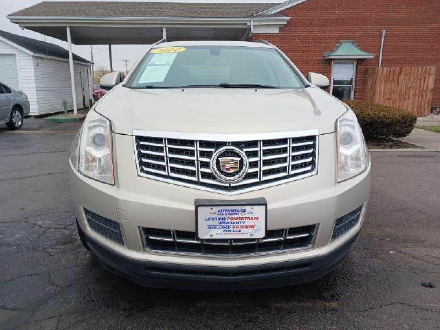 2014 Terra Mocha Metallic Cadillac SRX Standard FWD (3GYFNAE3XES) with an 3.6L V6 DOHC 24V FFV engine, 6-Speed Automatic transmission, located at 401 Woodman Dr, Riverside, OH, 45431, (937) 908-9800, 39.763779, -84.122063 - Photo#1