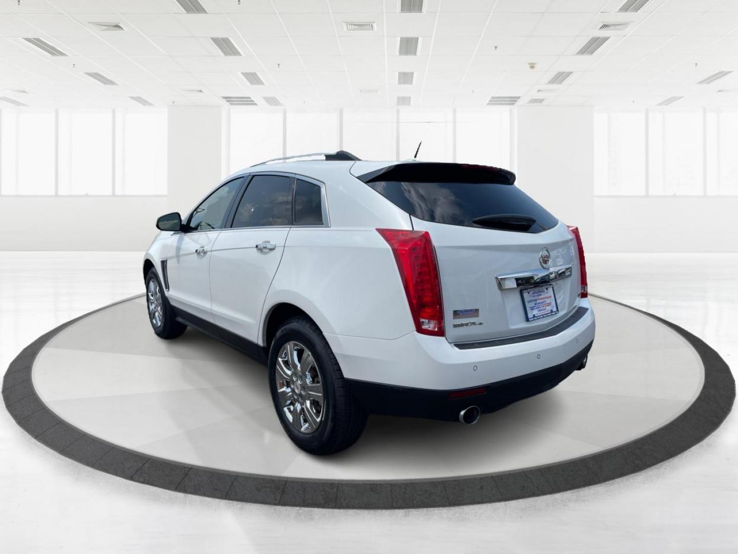 2014 Platinum Ice Tricoat Cadillac SRX (3GYFNEE33ES) with an 3.6L V6 DOHC 24V FFV engine, 6-Speed Automatic transmission, located at 401 Woodman Dr, Riverside, OH, 45431, (937) 908-9800, 39.763779, -84.122063 - Photo#4