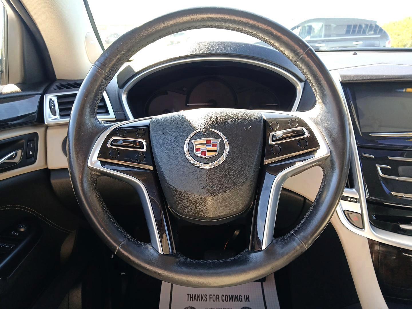 2014 Cadillac SRX Luxury Collection AWD (3GYFNEE30ES) with an 3.6L V6 DOHC 24V FFV engine, 6-Speed Automatic transmission, located at 1951 S Dayton Lakeview Rd., New Carlisle, OH, 45344, (937) 908-9800, 39.890999, -84.050255 - 2014 Cadillac SRX Luxury Collection AWD - Photo#15