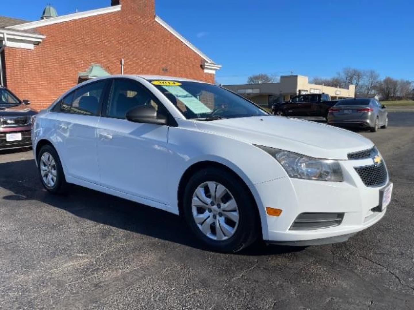 2014 Summit White Chevrolet Cruze LS Auto (1G1PA5SG7E7) with an 1.8L L4 DOHC 16V engine, 6-Speed Automatic transmission, located at 1184 Kauffman Ave, Fairborn, OH, 45324, (937) 908-9800, 39.807365, -84.029114 - Photo#0