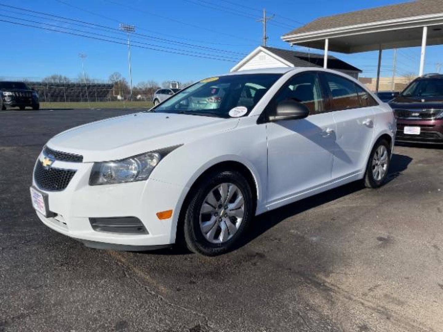 2014 Summit White Chevrolet Cruze LS Auto (1G1PA5SG7E7) with an 1.8L L4 DOHC 16V engine, 6-Speed Automatic transmission, located at 1184 Kauffman Ave, Fairborn, OH, 45324, (937) 908-9800, 39.807365, -84.029114 - Photo#1