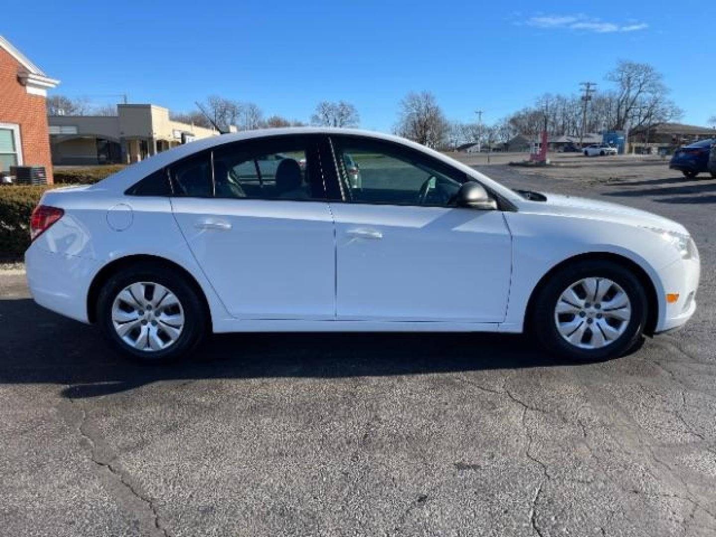 2014 Summit White Chevrolet Cruze LS Auto (1G1PA5SG7E7) with an 1.8L L4 DOHC 16V engine, 6-Speed Automatic transmission, located at 1184 Kauffman Ave, Fairborn, OH, 45324, (937) 908-9800, 39.807365, -84.029114 - Photo#3