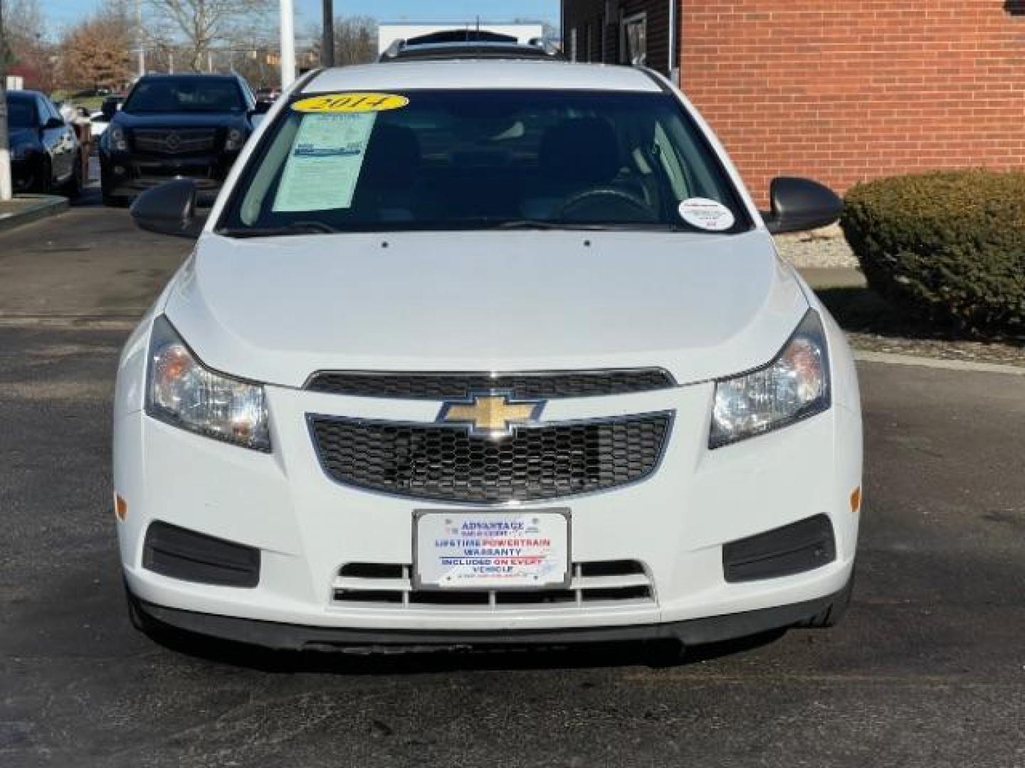 2014 Summit White Chevrolet Cruze LS Auto (1G1PA5SG7E7) with an 1.8L L4 DOHC 16V engine, 6-Speed Automatic transmission, located at 1184 Kauffman Ave, Fairborn, OH, 45324, (937) 908-9800, 39.807365, -84.029114 - Photo#4