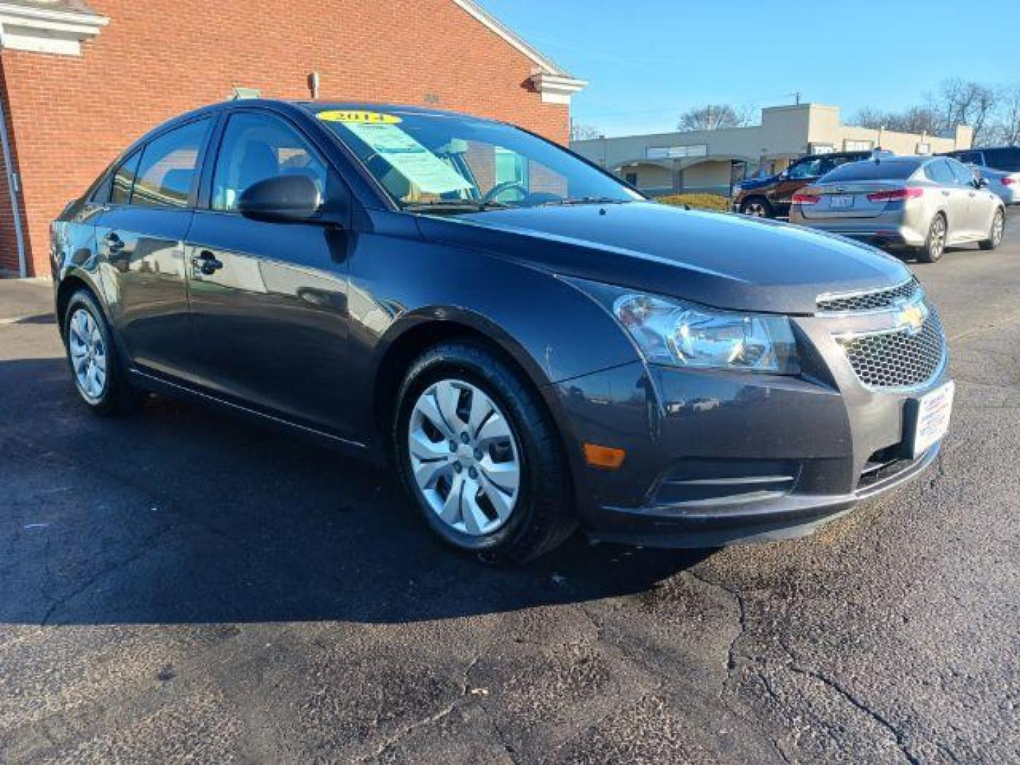 2014 Tungsten Metallic Chevrolet Cruze LS Auto (1G1PA5SH9E7) with an 1.8L L4 DOHC 16V FFV engine, 6-Speed Automatic transmission, located at 880 E. National Road, Vandalia, OH, 45377, (937) 908-9800, 39.892189, -84.181015 - Photo#0