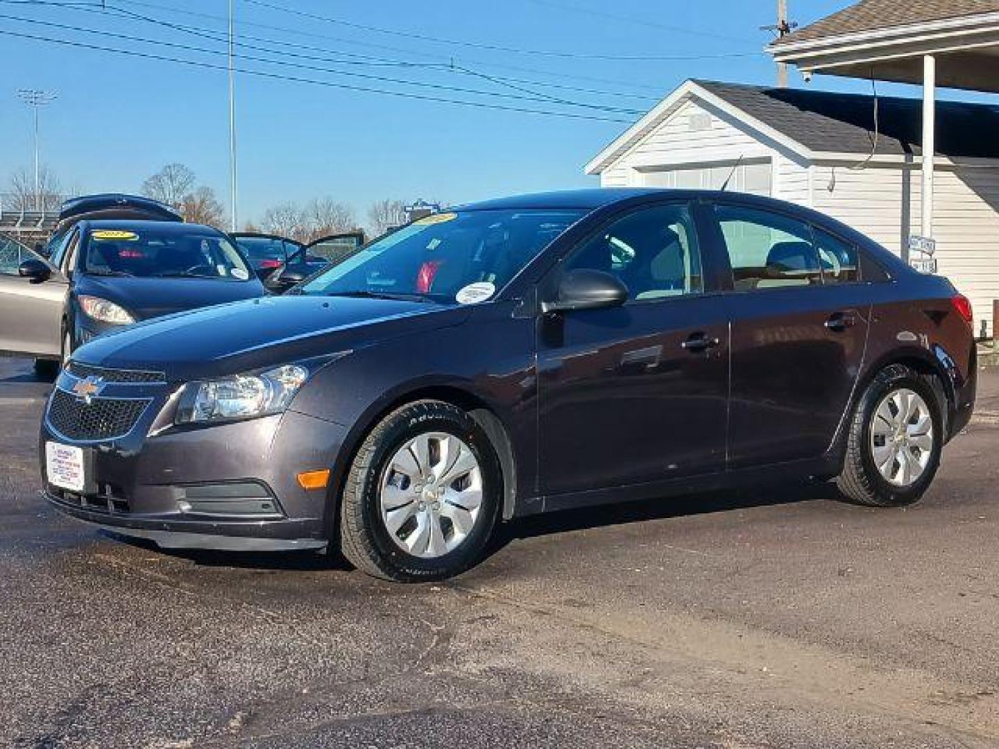 2014 Tungsten Metallic Chevrolet Cruze LS Auto (1G1PA5SH9E7) with an 1.8L L4 DOHC 16V FFV engine, 6-Speed Automatic transmission, located at 880 E. National Road, Vandalia, OH, 45377, (937) 908-9800, 39.892189, -84.181015 - Photo#2