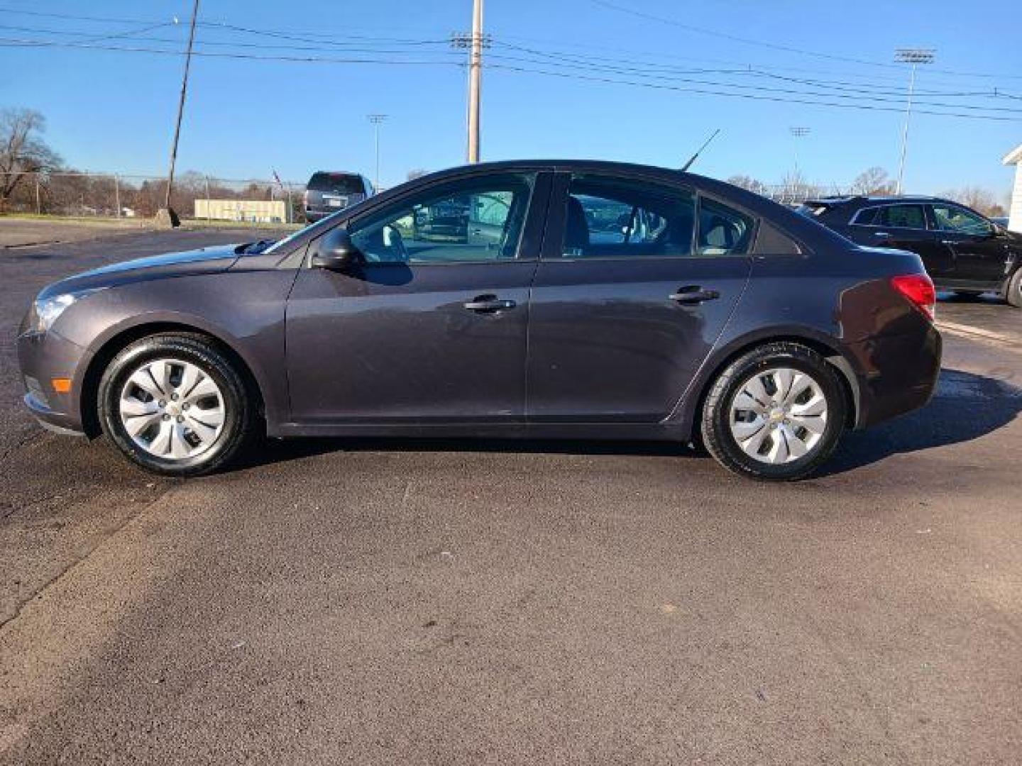 2014 Tungsten Metallic Chevrolet Cruze LS Auto (1G1PA5SH9E7) with an 1.8L L4 DOHC 16V FFV engine, 6-Speed Automatic transmission, located at 880 E. National Road, Vandalia, OH, 45377, (937) 908-9800, 39.892189, -84.181015 - Photo#3