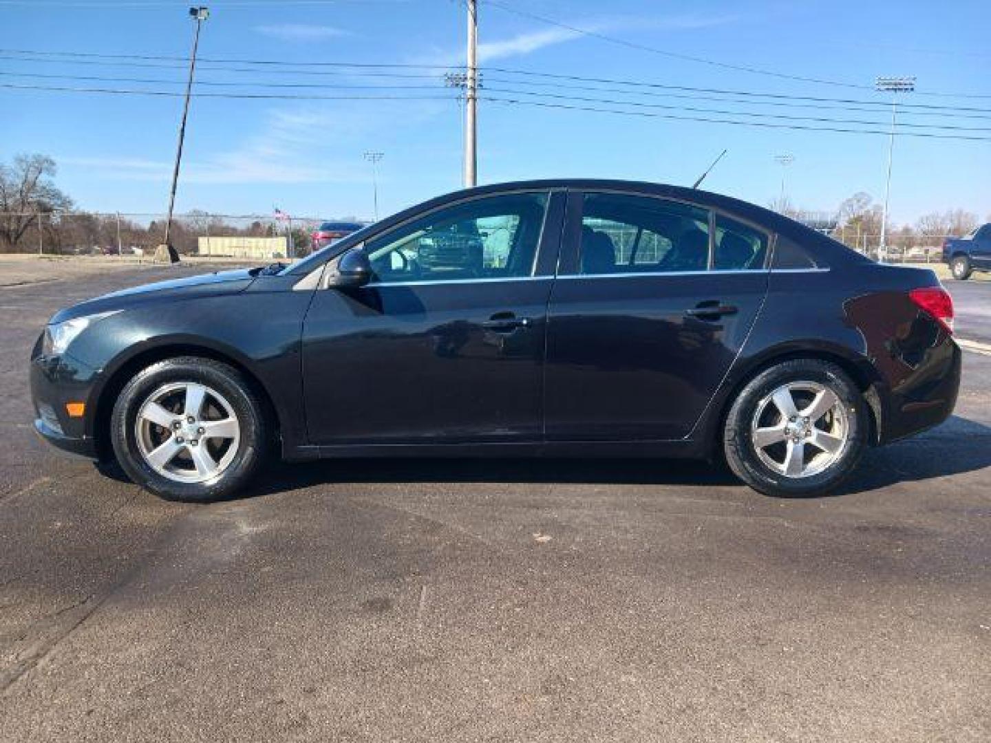 2014 Black Granite Metallic Chevrolet Cruze 1LT Auto (1G1PC5SB2E7) with an 1.4L L4 DOHC 16V TURBO engine, 6-Speed Automatic transmission, located at 880 E. National Road, Vandalia, OH, 45377, (937) 908-9800, 39.892189, -84.181015 - Photo#3